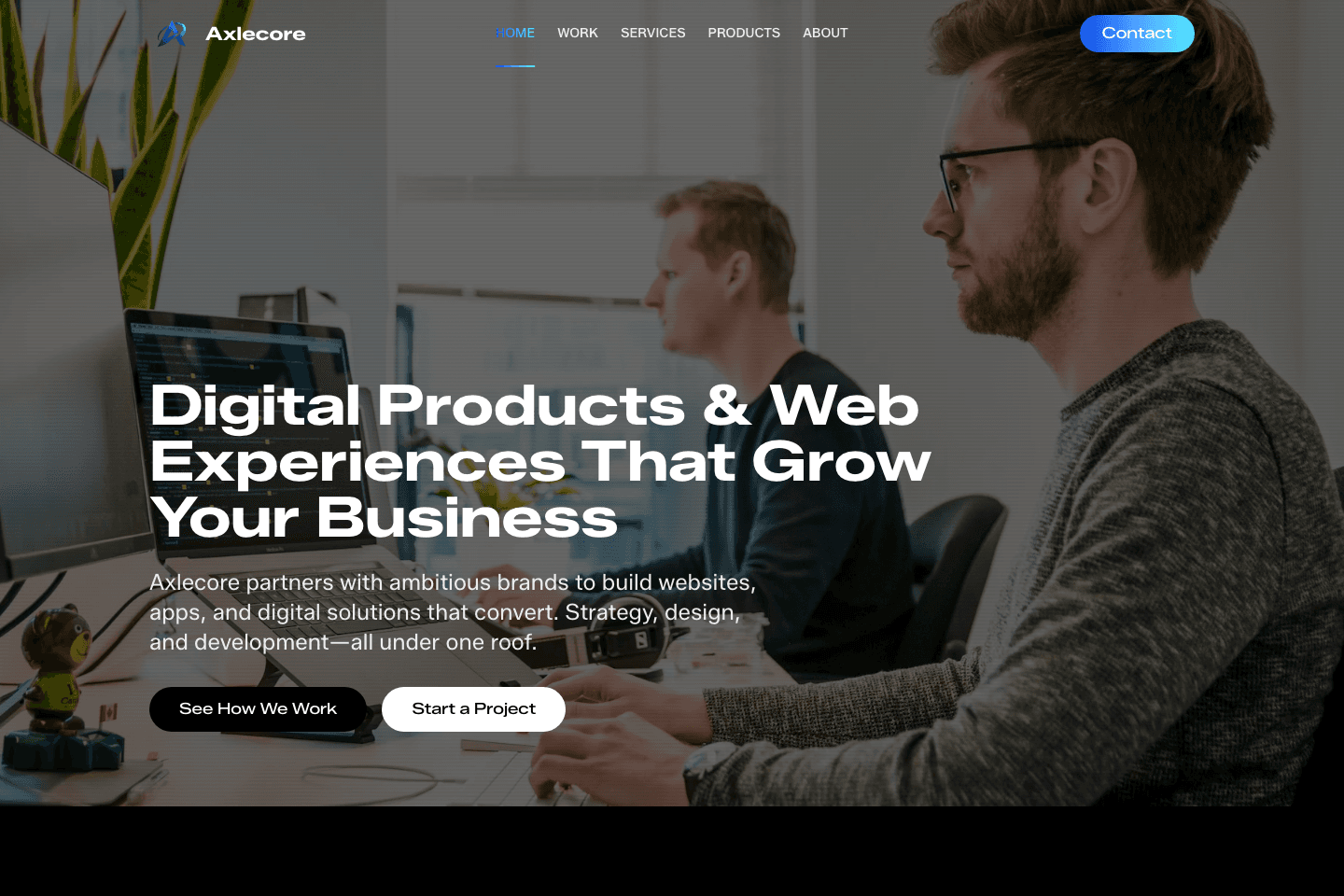 The Axlecore homepage, headline and calls to action over a studio photograph